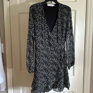 Sheer black wrap dress with white dots